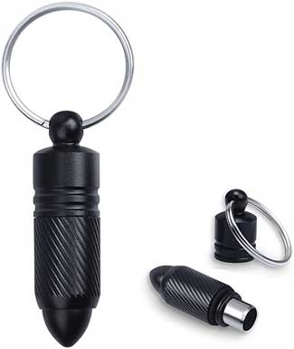 Black punch cigar cutter on white background, shown in both open and closed positions