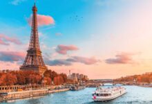 River cruise down the Seine in Paris with Eiffel Tower in background