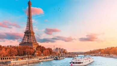 River cruise down the Seine in Paris with Eiffel Tower in background