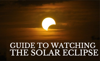 Solar eclipse in the sky (caption: Guide To Watching The Solar Eclipse)